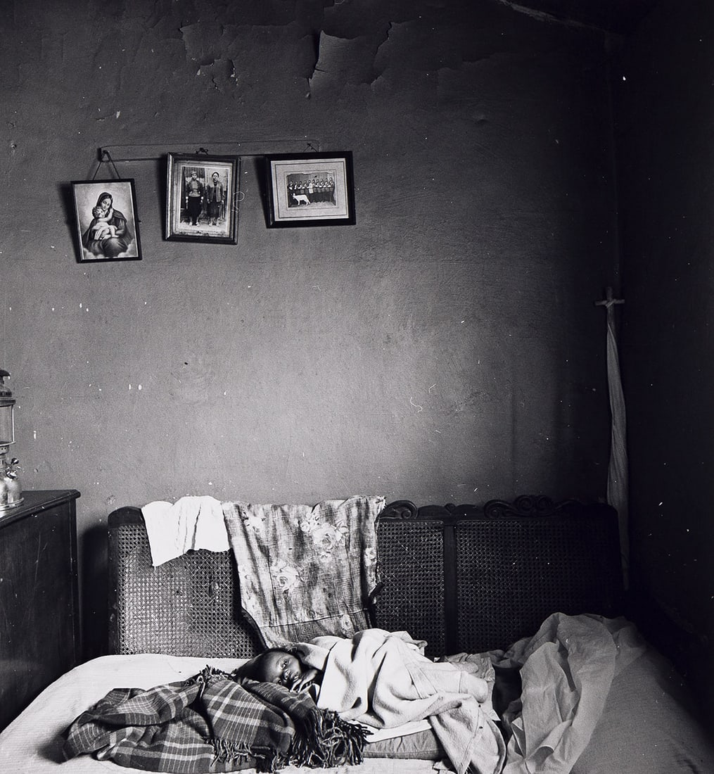 DAVID GOLDBLATT (1930-2018) Untitled [Child on bed]. Circa 1972.: DAVID GOLDBLATT (1930-2018) Untitled [Child on bed]. Circa 1972. Silver print, the image measuring 6¾x6¼ inches (17.1x15.9 cm.), the sheet 10x8 inches (25.4x20.3 cm.), unsigned, with a South