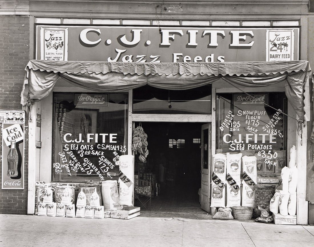 WALKER EVANS (1903 - 1975) Storefront of C.J. Fite Jazz Feeds, Alabama. 1936; printed 1980s.: WALKER EVANS (1903 - 1975) Storefront of C.J. Fite Jazz Feeds, Alabama. 1936; printed 1980s. Silver print, the image measuring 187x235 mm; 7⅜x9¼ inches, the sheet slightly larger, with the
