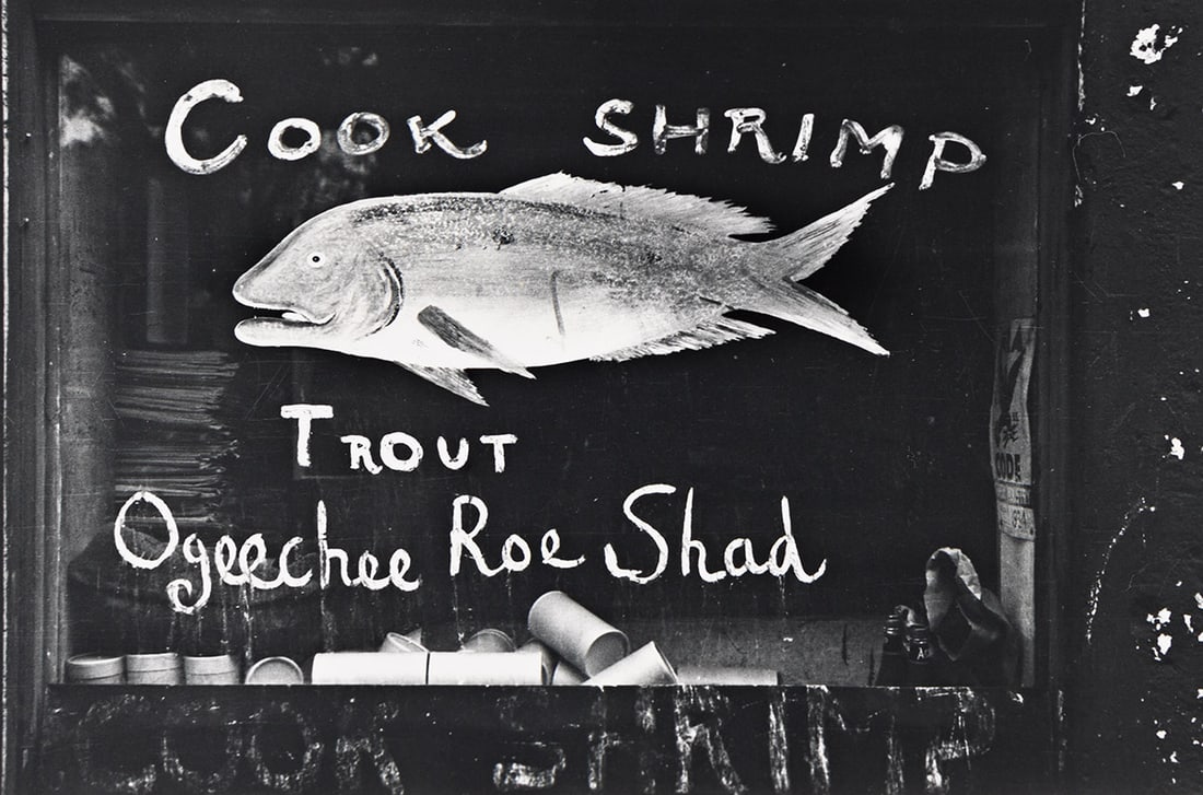 WALKER EVANS (1903 - 1975) Painted Fish Store Sign, Savannah Vicinity, Georgia. 1934-35: WALKER EVANS (1903 - 1975) Painted Fish Store Sign, Savannah Vicinity, Georgia. 1934-35; printed circa 1960s. Silver print, the image measuring 117x178 mm; 4⅝x7 inches, the sheet 203x254 mm; 8x1