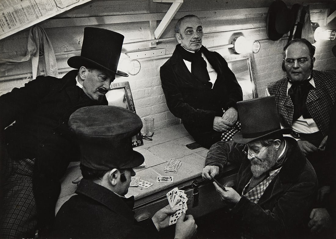 W. EUGENE SMITH (1918-1978) Backstage dressing room at The Met ( the chorus playing cards). 1953.: W. EUGENE SMITH (1918-1978) Backstage dressing room at The Met ( the chorus playing cards). 1953. Silver print, the image measuring 9⅝x13½ inches (24.4x34.3 cm.), the mount 18x15¾ inch