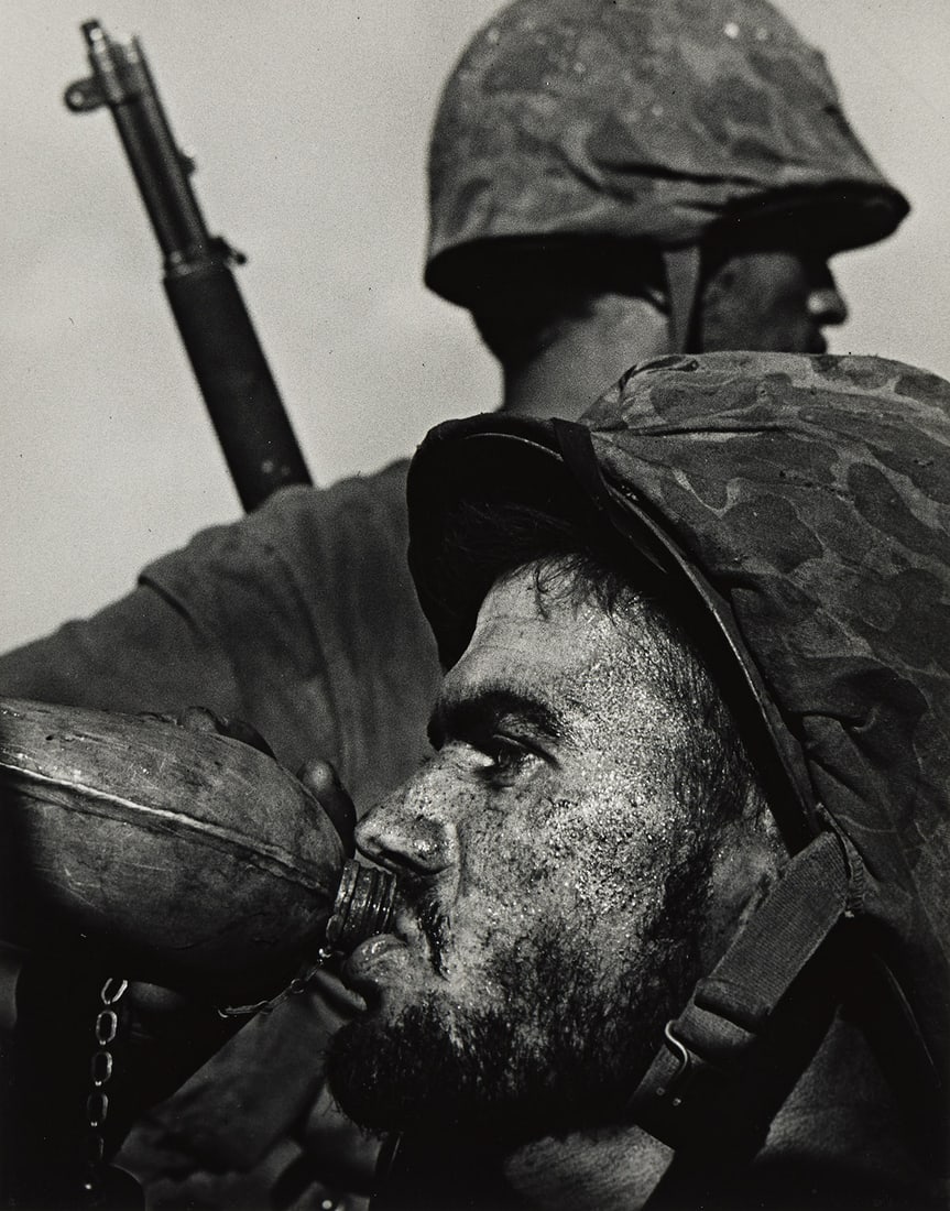 W. EUGENE SMITH (1918-1978) Saipan (two soldiers). 1944; printed 1970s.: W. EUGENE SMITH (1918-1978) Saipan (two soldiers). 1944; printed 1970s. Silver print, the image measuring 13⅜x10½ inches (34x26.7 cm.), the mount 20x16 inches (50.8x40.6 cm.), with Smith's