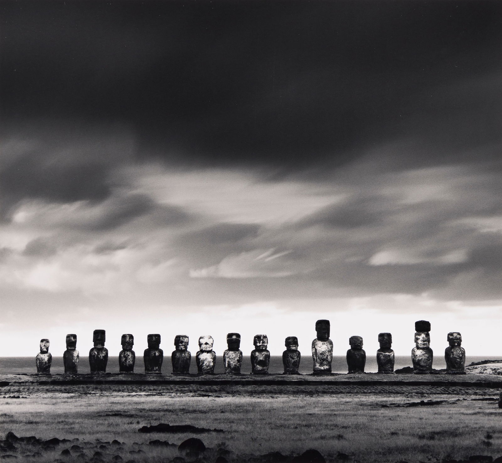 MICHAEL KENNA (1953- ) Moai, Study 50, Ahu Tongariki, Easter Island. 2001.: MICHAEL KENNA (1953- ) Moai, Study 50, Ahu Tongariki, Easter Island. 2001. Silver print, the image measuring 7⅜x8 inches (18.7x20.3 cm.), the mount 20x16 inches (50.8x40.6 cm.), with Kenna’