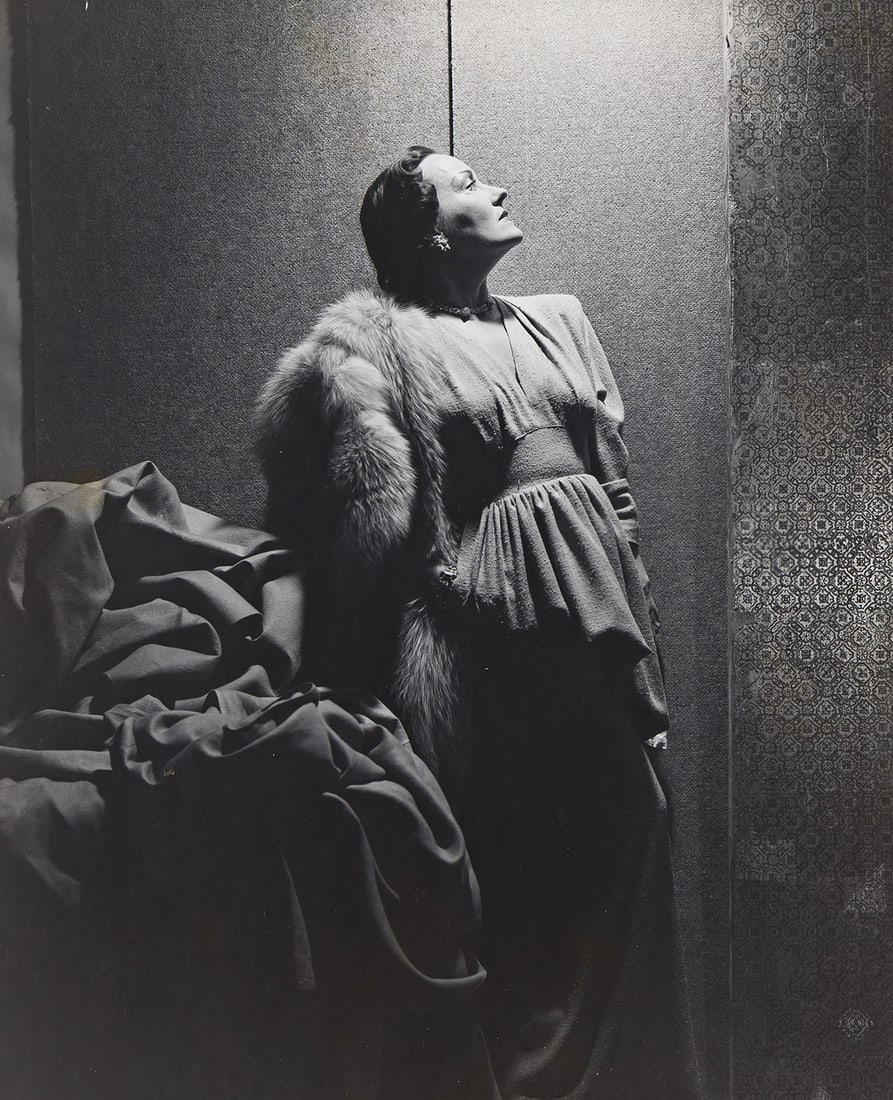 CECIL BEATON (1904-1980) Gloria Swanson for Vogue. 1946.: CECIL BEATON (1904-1980) Gloria Swanson for Vogue. 1946. Silver contact print, the image measuring 9⅝x7⅞ inches (24.4x20 cm.), the sheet slightly larger, with Beaton's credit stamp and the