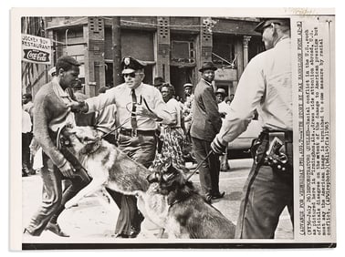 (CIVIL RIGHTS.) [William Hudson, photographer.] Iconic photograph of police dogs attacking a