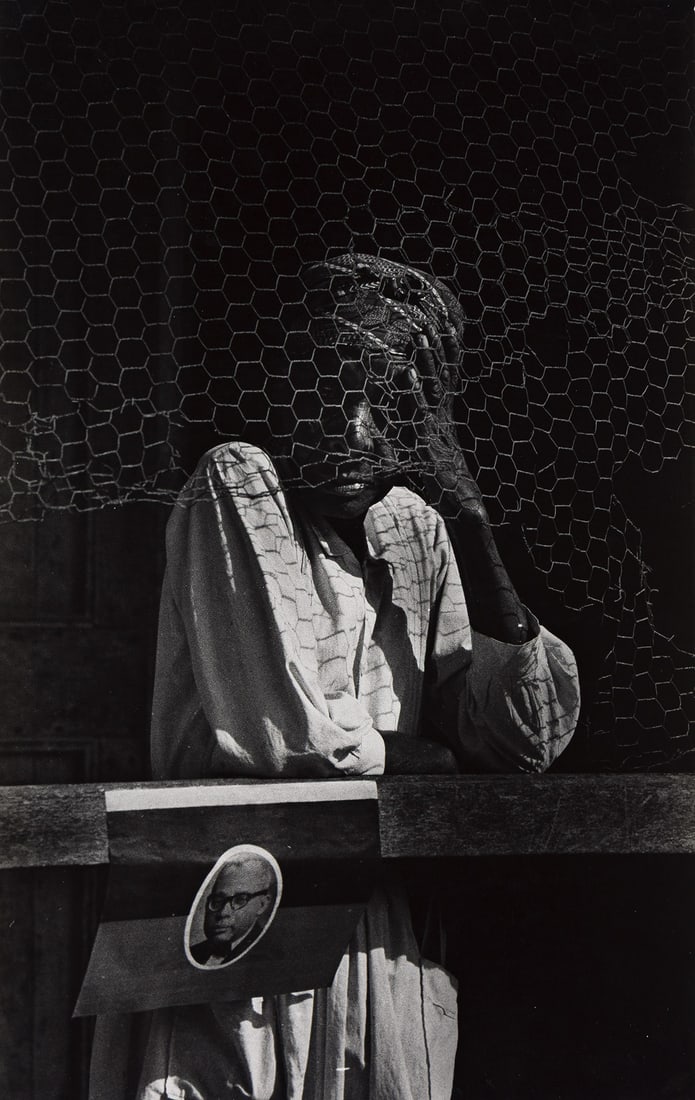 W. EUGENE SMITH (1918-1978) Haiti. 1958-59; printed early 1970s.: W. EUGENE SMITH (1918-1978) Haiti. 1958-59; printed early 1970s. Silver print, the image measuring 18½x11⅝ inches (47x29.5 cm.), with Smith’s credit address stamp on verso. Condition