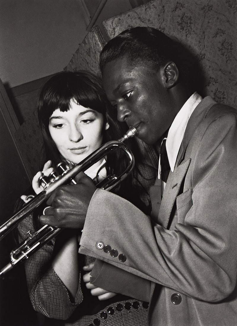 JEAN-PHILIPPE CHARBONNIER (1921-2004) Juliette Greco and Miles Davis, salle Pleyel, Paris. 1949;: JEAN-PHILIPPE CHARBONNIER (1921-2004) Juliette Greco and Miles Davis, salle Pleyel, Paris. 1949; printed 2002. Silver print, the image measuring 17⅜x12⅝ inches (44.1x32.1 cm.), the sheet 2