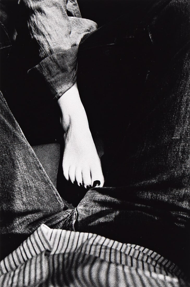 RALPH GIBSON (1939- ) Woman's Foot on Man's Crotch. 1972; printed 1980s.: RALPH GIBSON (1939- ) Woman's Foot on Man's Crotch. 1972; printed 1980s. Silver print, the image measuring 9¼x6⅛ inches (23.5x15.6 cm.), the sheet 14x11 inches (35.6x27.9 cm.), with Gibson'