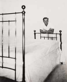 George Platt Lynes, Alexander Jensen Yow Leaning on Bed. Circa 1952.