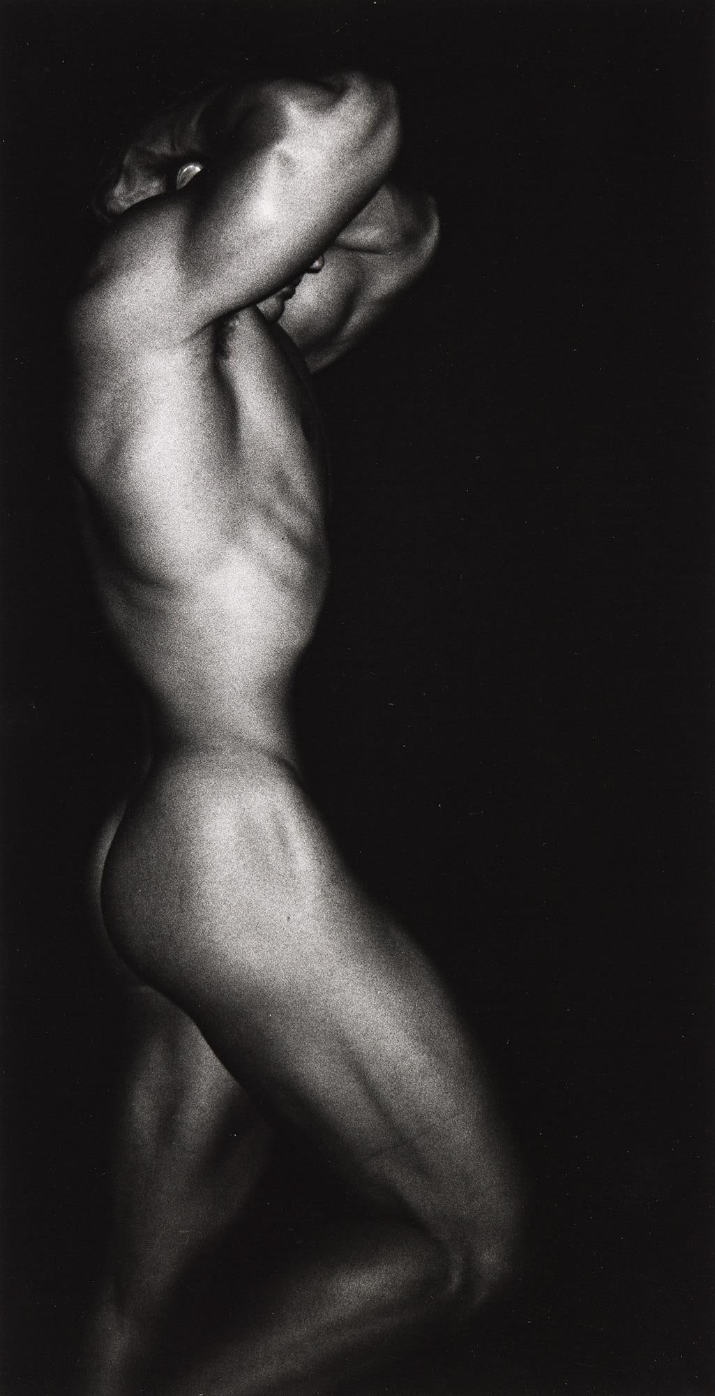 Geoffrey Holder, Male nude figure. Circa 1980s.: Geoffrey Holder 1930-2014 Male nude figure. Circa 1980s. Silver print With Holder's signature in pencil on verso. the image measuring 14 x 7 1/4 in. (35.6 x 18.4 cm.) Collection of Geoffrey Holder