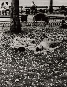 Ernst Haas, Couple lying in Washington Square Park, NYC, silver print, 1950s; printed later.