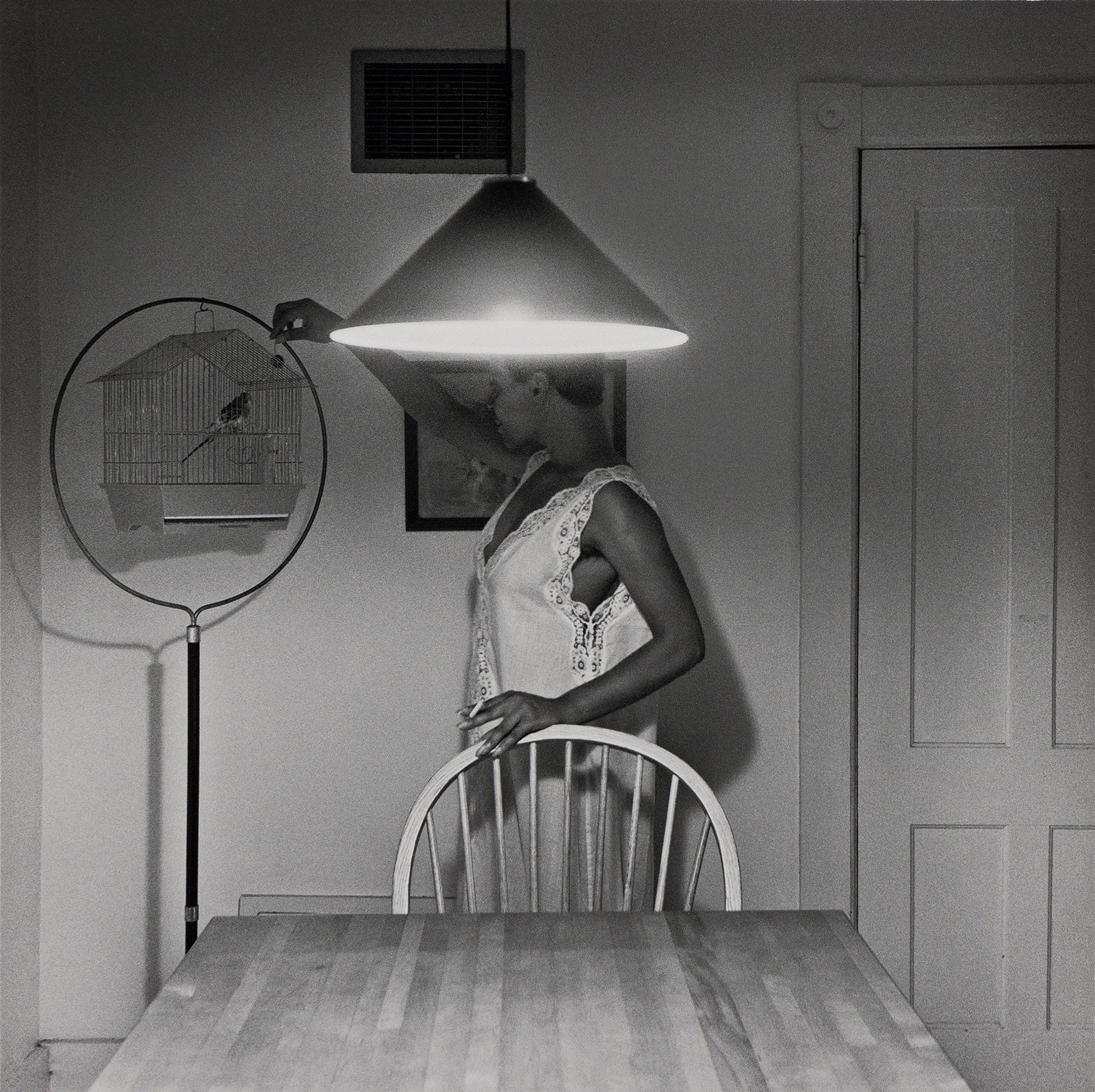 Carrie Mae Weems (1953-), Untitled (Woman Feeding Bird), 1990.: Carrie Mae Weems(1953-)Untitled (Woman Feeding Bird).Inkjet print on Hahnem¸hle paper, 1990.Signed in ink, verso. Printed by Michael Lundgren and published by Radius Books in 2022 for the limited