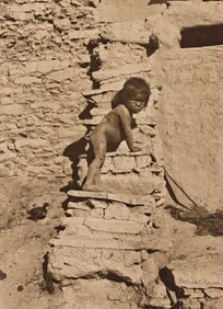 Frederick Monson. Native American child climbing wall. Circa 1900.