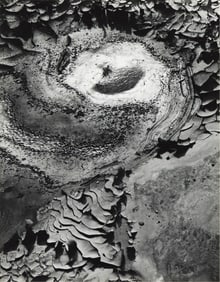 Minor White. Sunspot in Cracked Mud, Capitol Reef, Utah. 1961; printed circa 1970.