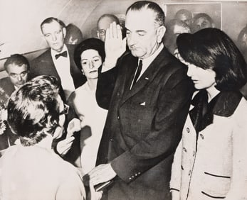Lyndon B. Johnson Sworn In as President on Air Force One with Jackie Kennedy. 1963.
