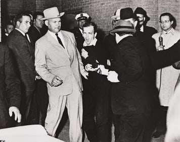 A pair of photographs depicting Jack Ruby shooting Lee Harvey Oswald. 1963.