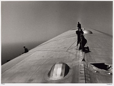 Alfred Eisenstaedt. Repairing the Hull of the Graf Zeppelin during the Flight over the Atlantic.