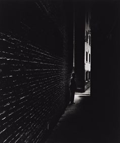 Bill Brandt. Policeman in a Bermondsey Alley. 1938; printed 1970s.