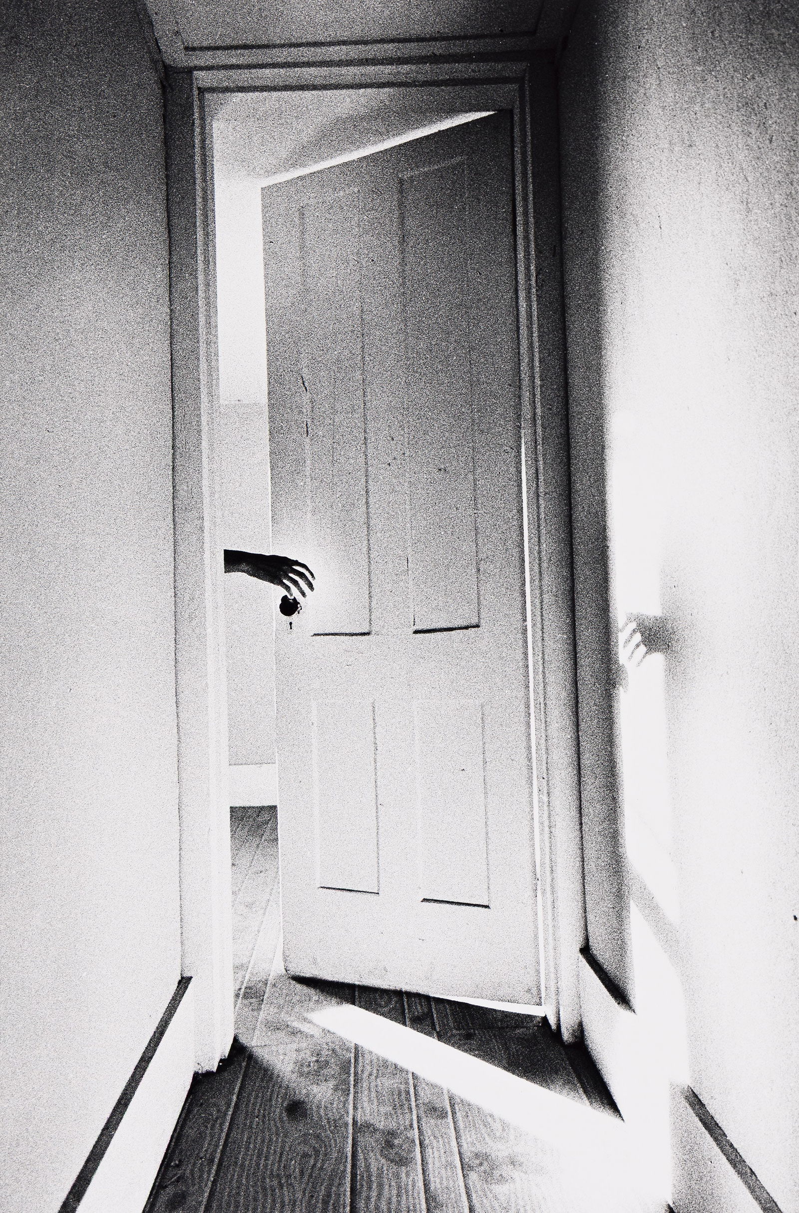 Ralph Gibson. Hand Through Doorway. 1969; printed 1980s.: Ralph Gibson1939-Hand Through Doorway. 1969; printed 1980s.Silver printWith Gibson's signature, negative date, and edition notation "AP" in pencil on verso.The image 12 1/2 x 8 1/4 in. (31.8 x 21 cm.)