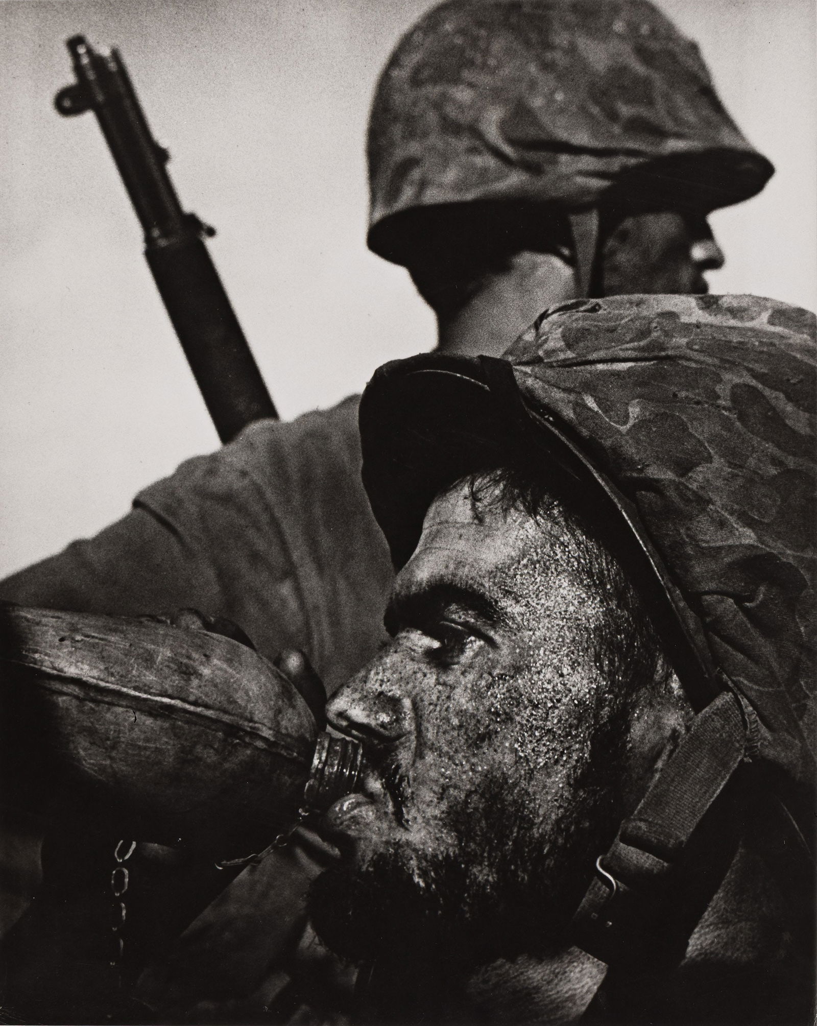 W. Eugene Smith. Saipan (two soldiers). 1944; printed 1960s.: W. Eugene Smith1918-1978Saipan (two soldiers). 1944; printed 1950s.Silver printWith Smith's signature with a stylus on recto.The image 13 1/4 x 10 5/8 in. (33.7 x 27 cm.), the sheet slightly larger