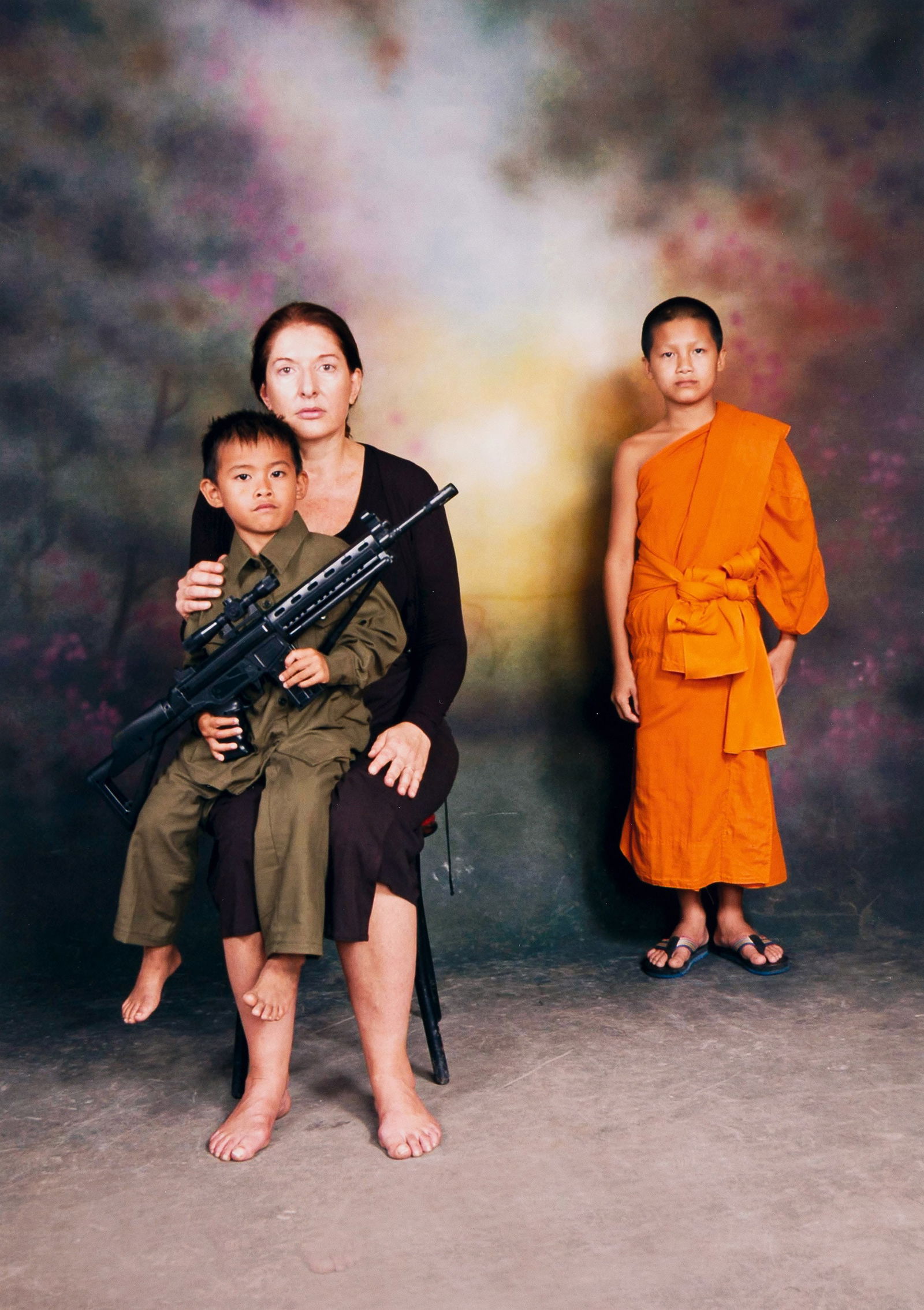 Marina Abramovic, Dinh Q. LÍ, Shirin Neshat, et alia. Portfolio of 12 photographic diptychs:: Portfolio of 12 photographic diptychs: The Quiet in the Land. 2006.C-prints (8) and 4 pigment (4) printsWith works by Marina Abramovic, Janine Antoni, Hans Georg Berger, Cai Guo-Qiang, Ann Hamilton, D