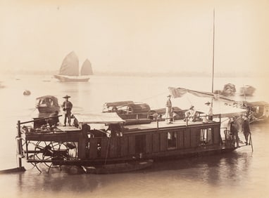 An album featuring more than 125 photographs, primarily from Hong Kong, including 4 documenting