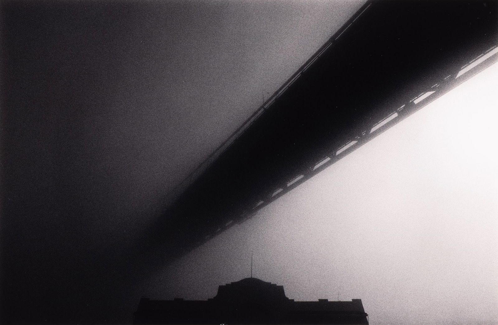 Michael Kenna. Bay Bridge and Pier, San Francisco, California. 1985; printed 1986.: Michael Kenna1953-Bay Bridge and Pier, San Francisco, California. 1985; printed 1986.Sepia and selenium-toned silver printWith Kenna's signature, negative date, and edition notation 2/45 in pencil on