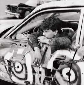 Danny Lyon. Defeated Demo Driver, Wall Stadium, New Jersey, from the series The Pits. 1988, printed