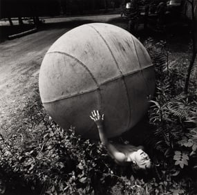 Arthur Tress. Boy with Giant Ball * Father & Daughter, Cape. 1969-70; printed 1969 and 1970s.