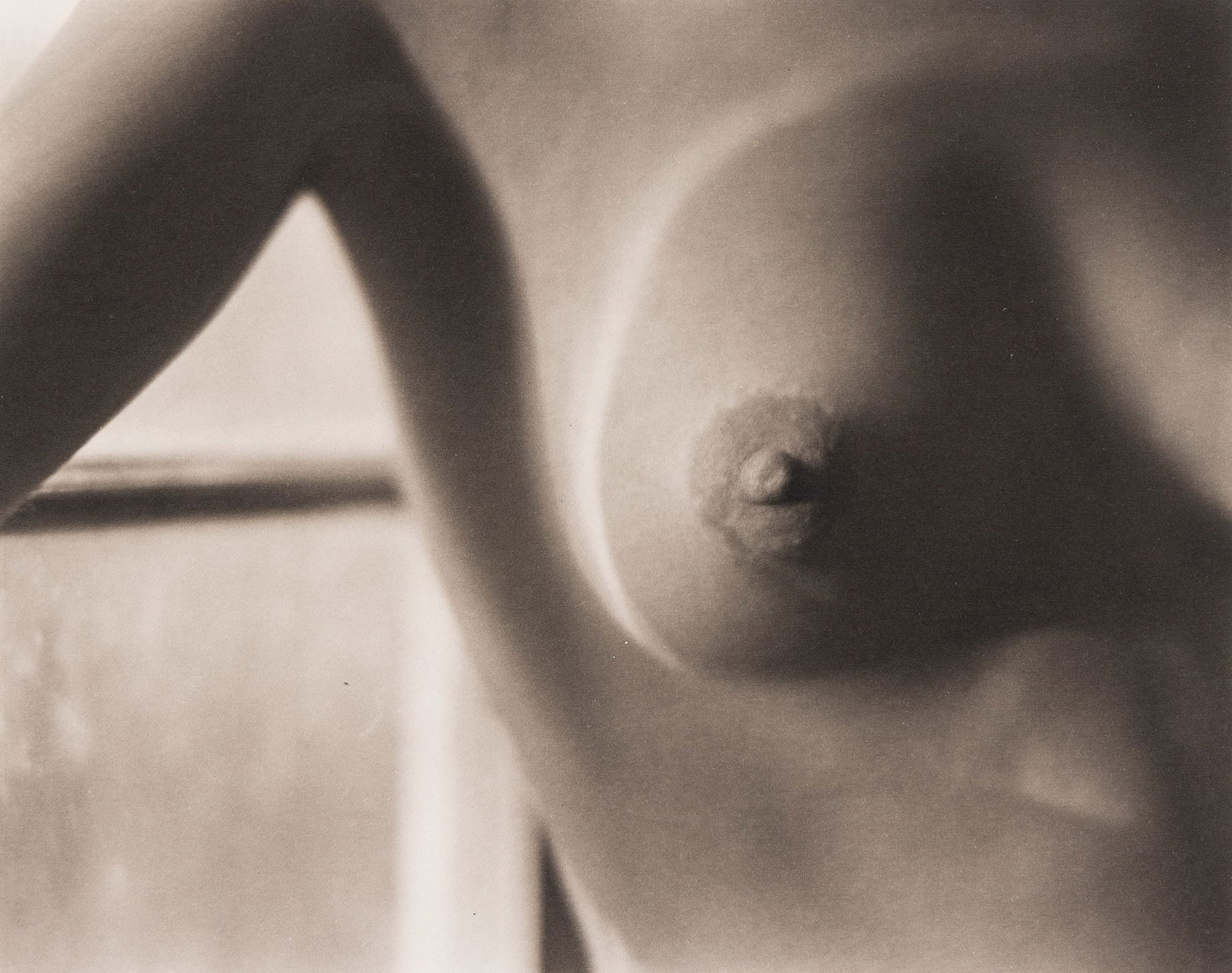 Edward Weston. Nude (Breast with window). 1922; printed 1970s by Cole Weston.: Edward Weston1886-1958Nude (Breast with window). 1922; printed 1970s by Cole Weston.Platinum printWith the Negative by Edward Weston stamp with Cole Weston' signature in pencil, and the title, negativ