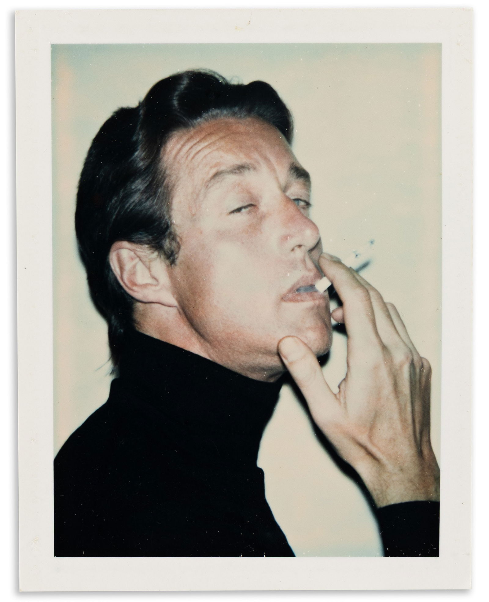 Andy Warhol. Halston II (Roy Halston Frowick). 1974.: Andy Warhol1928-1987Halston II (Roy Halston Frowick). 1974.Unique Polacolor Type 108 PolaroidThe image 3 3/4 x 2 7/8 in. (9.5 x 7.3 cm.), the sheet 4 1/4 x 3 3/8 in. (10.8 x 8.6 cm.) Provenance: