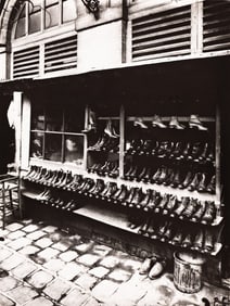 Eugène Atget. Stall of Shoes at the Marché des Carmes, Place Maubert. Circa 1890; printed