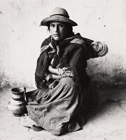 Irving Penn. Young woman with baby on her back and jug, Cuzco. 1948.