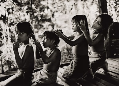 Sebastião Salgado. Mentawai, Indonesia [children combing their hair]. 2008; printed 2009.