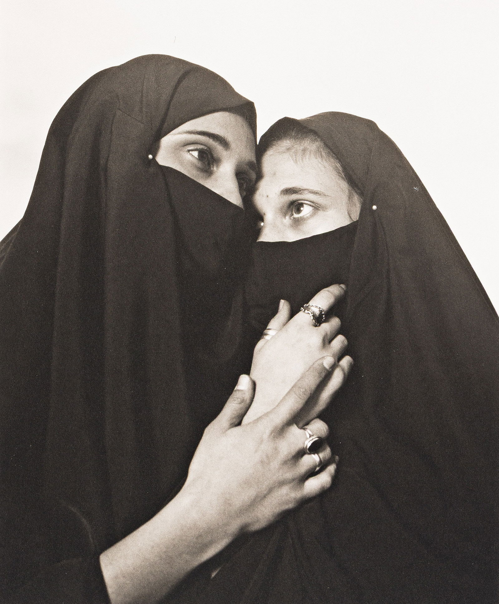 Andres Serrano. Istanbul (Sisters). 1996.: Andres Serrano1950-Istanbul (Sisters). 1996.Platinum printWith Serrano's signature and edition notation 45/125 in pencil on verso.The image 9 3/4 x 8 in. (24.8 x 20.3 cm.), the sheet 11 3/4 x 10 in. (