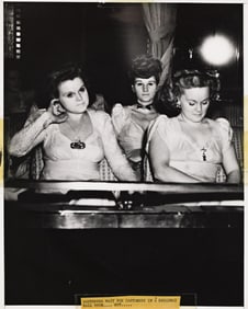 Weegee [Arthur Fellig]. Three women at the theater. 1940s.