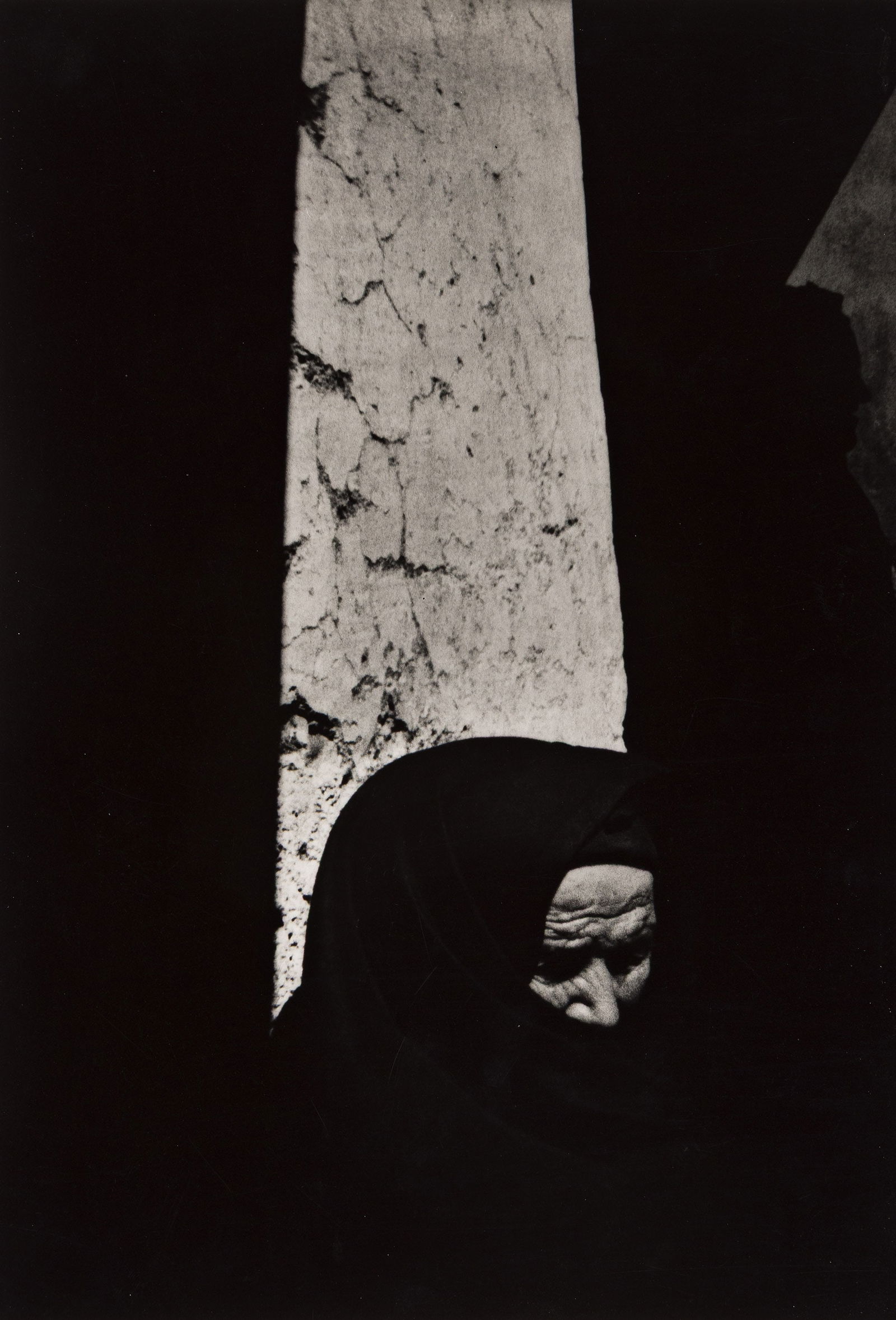 W. Eugene Smith. Woman in Shroud, from Spanish Village. 1951; printed circa 1960.: W. Eugene Smith1918-1978Woman in Shroud, from Spanish Village. 1951; printed circa 1960.Silver printWith Smith's Estate "Photograph by W. Eugene Smith" and "authenticated photograph" stamps on verso.T