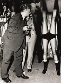 Weegee [Arthur Fellig]. Self-portrait and legs distortion. 1950s.