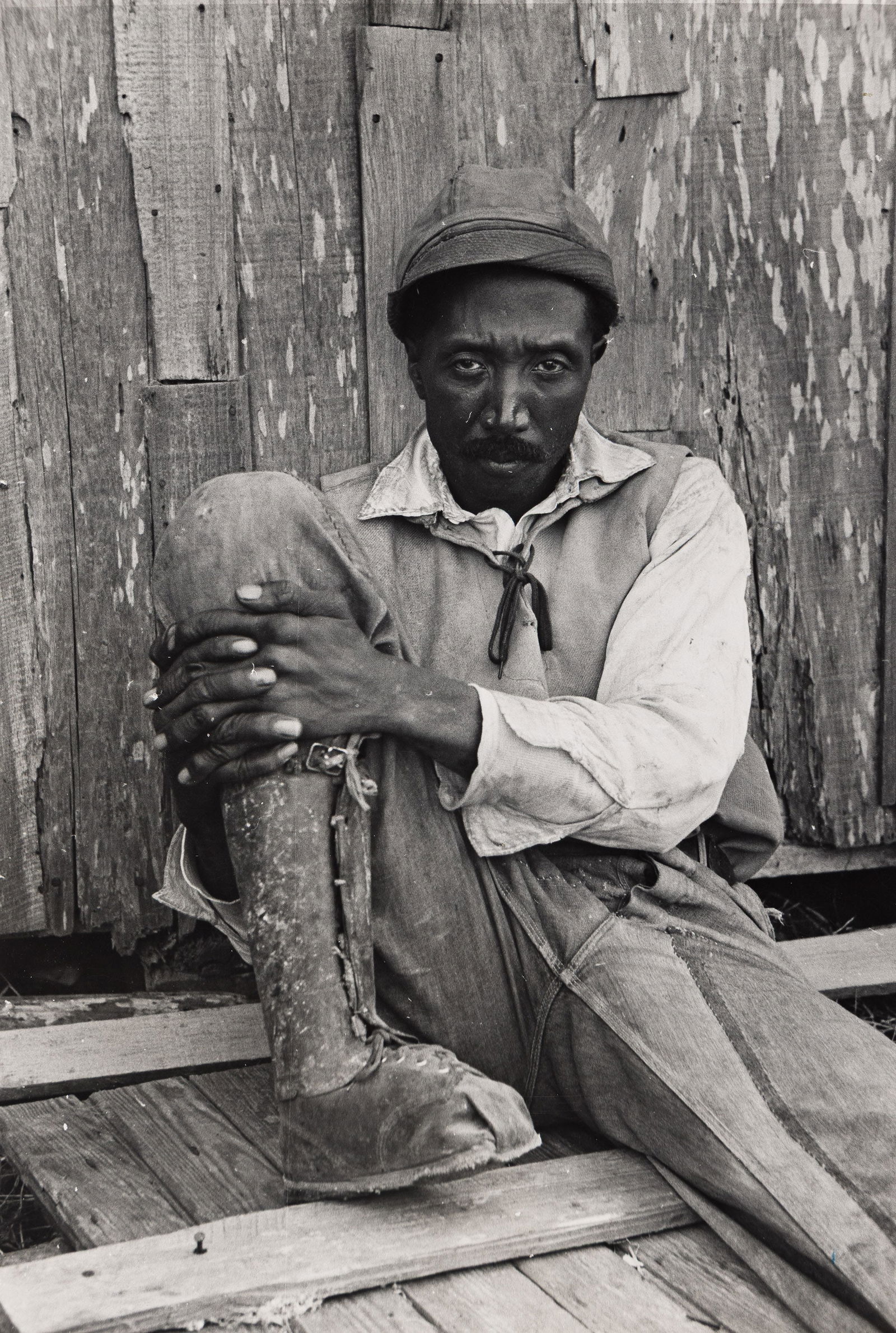 Russell Lee, Sugar Cane Worker in Louisiana * Doll Buggy on farm near Northome, Minnesota, Circa (1 of 2)