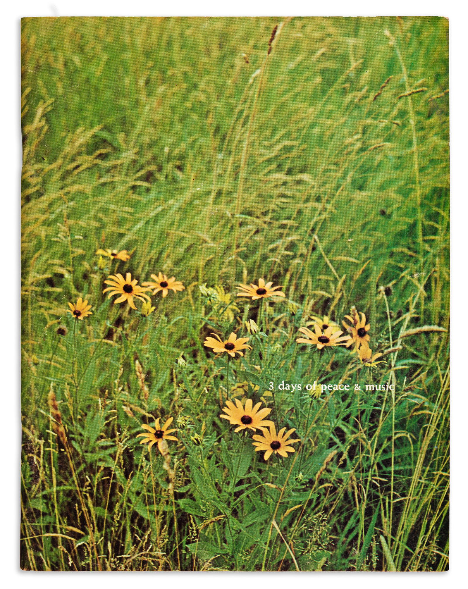 Official program for the Woodstock festival, with two related underground newspapers. 1969. (1 of 3)