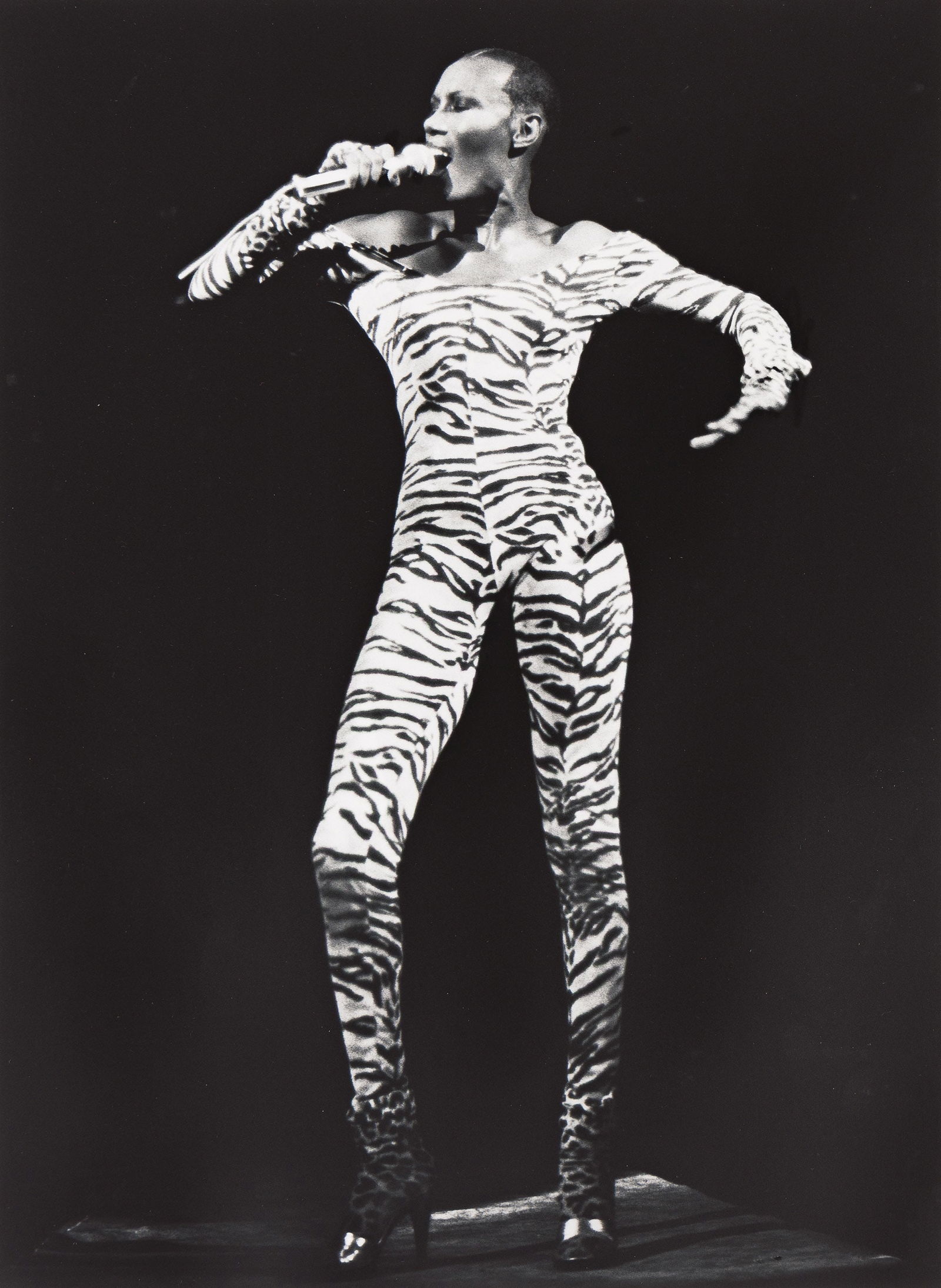 JEB (Joan E. Biren), Grace Jones, Washington D.C. 1978; printed 2025.: JEB (Joan E. Biren)1944-Grace Jones, Washington D.C. 1978; printed 2025.Archival pigment printWith JEB's signature, title, and negative and print dates in ink on verso.The image 11 3/8 x 8 3/8 in. (28