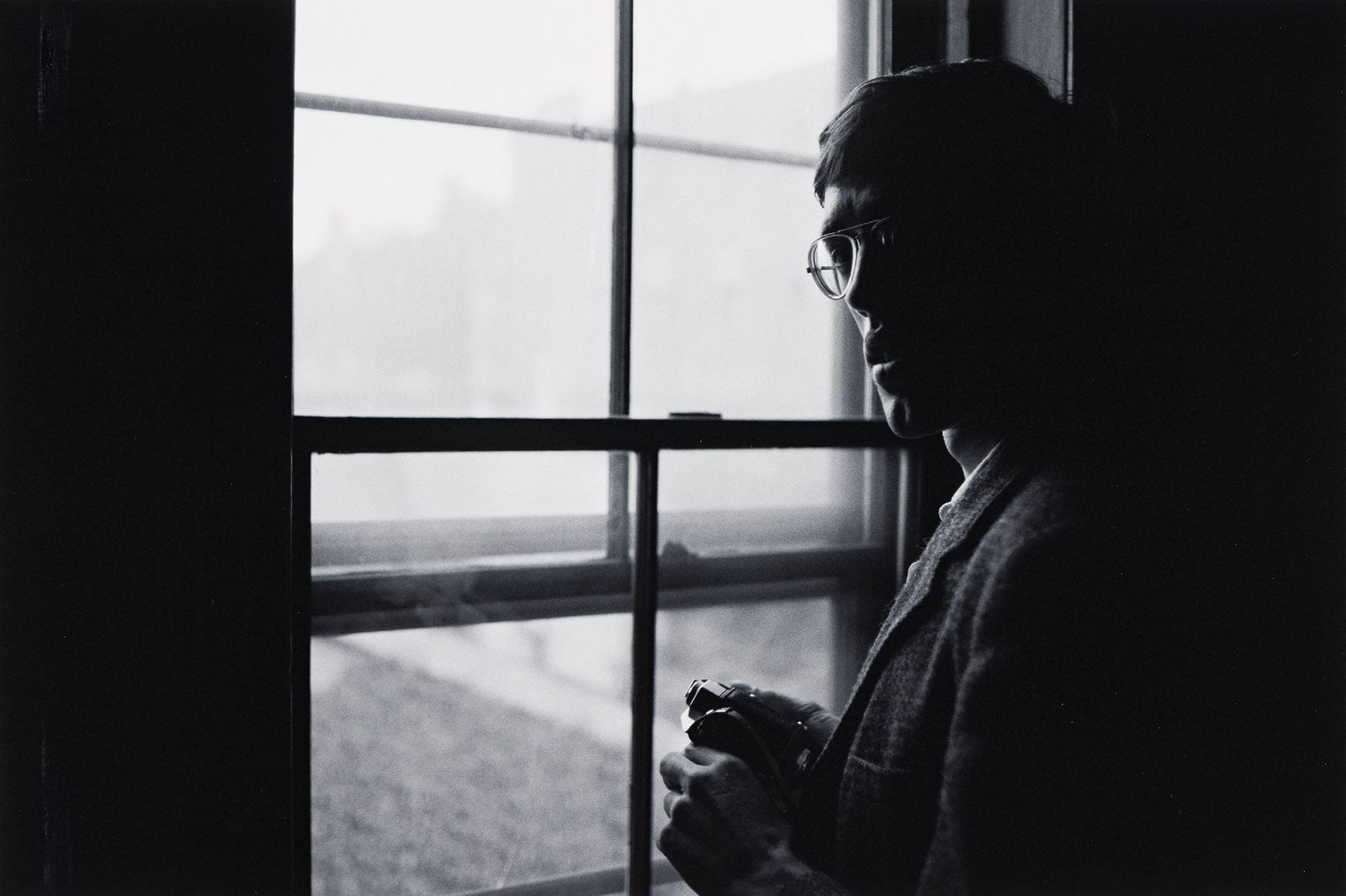 Dirk Rowntree, David Wojnarowicz at Window with Camera. 1977; printed 2025. (1 of 1)