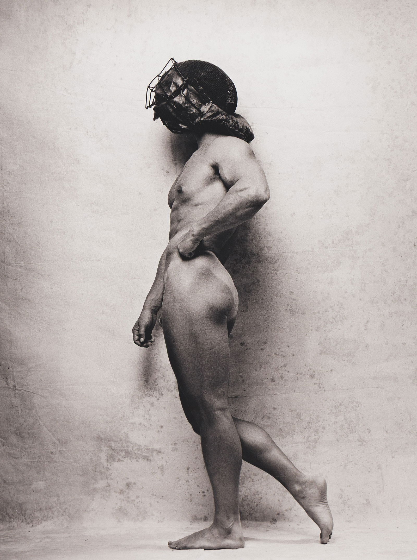 Blake Little, Nude with mask. 1990.: Blake Little1956-Nude with mask. 1990.Silver printWith Little's signature, edition notation 9/25, and inventory number in pencil on verso.The image 17 7/8 x 13 3/4 in. (45.4 x 34.9 cm.), the sheet 19