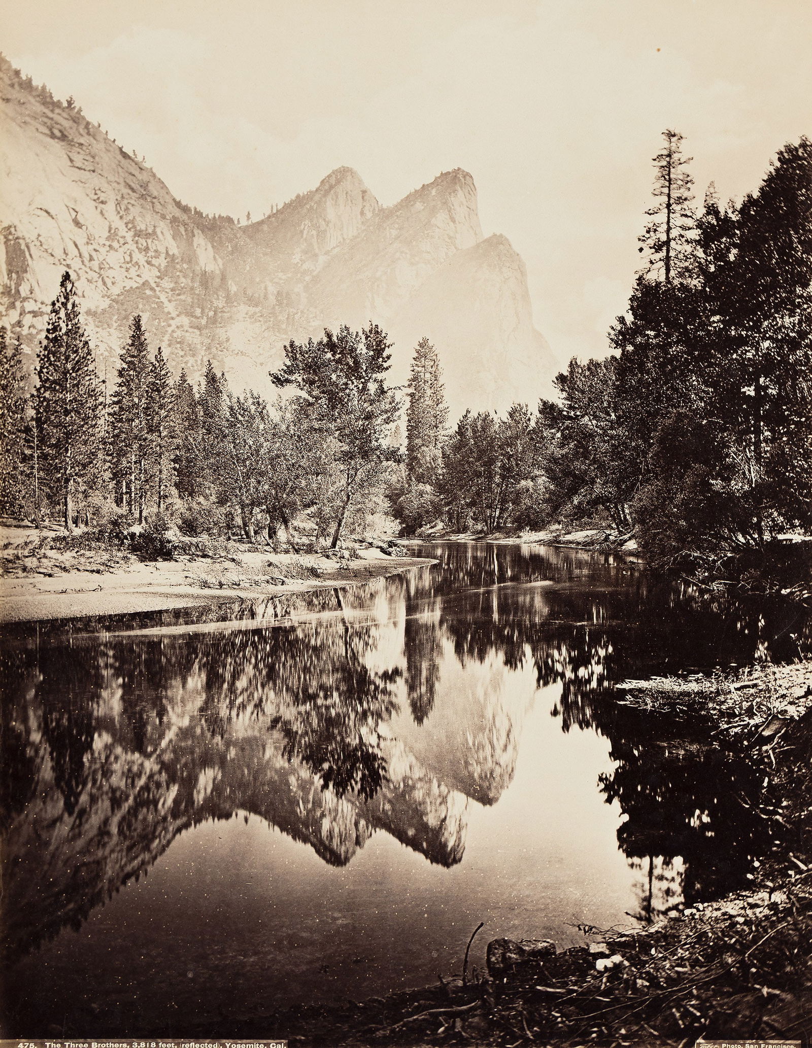 Isaiah West Taber. The Three Brothers, 3,818 feet, reflected, Yosemite, California. Circa 1872; (1 of 1)
