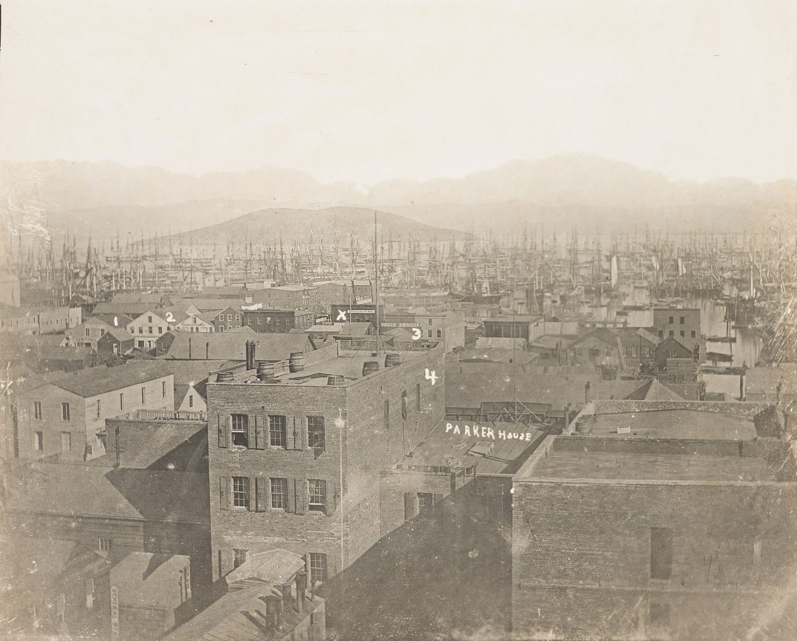 An early two-part panorama of the San Francisco Waterfront, with thousands of ships in the harbor, (1 of 2)