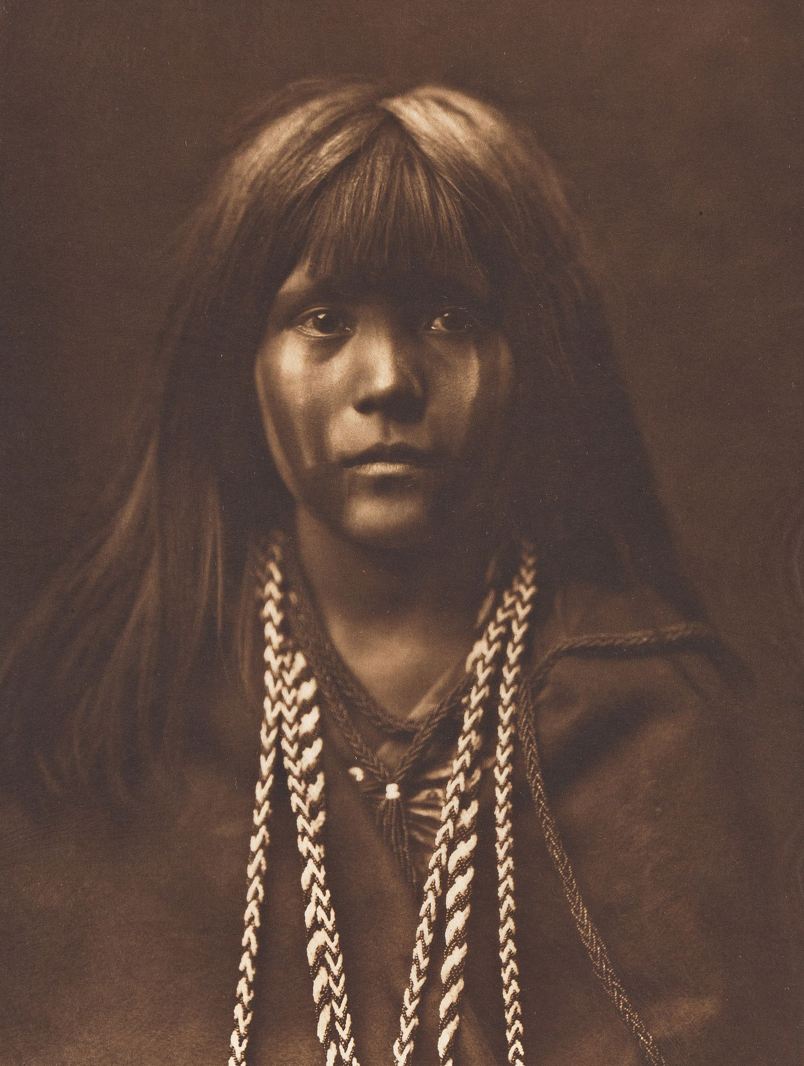 Edward S. Curtis. Mosa - Mohave, plate 61 from The North American Indian. 1903.: Edward S. Curtis1868-1952Mosa - Mohave, plate 61 from The North American Indian. 1903.Photogravure on Japanese tissueWith Curtis' printed copyright, credit, title, plate number, and the printer's cred