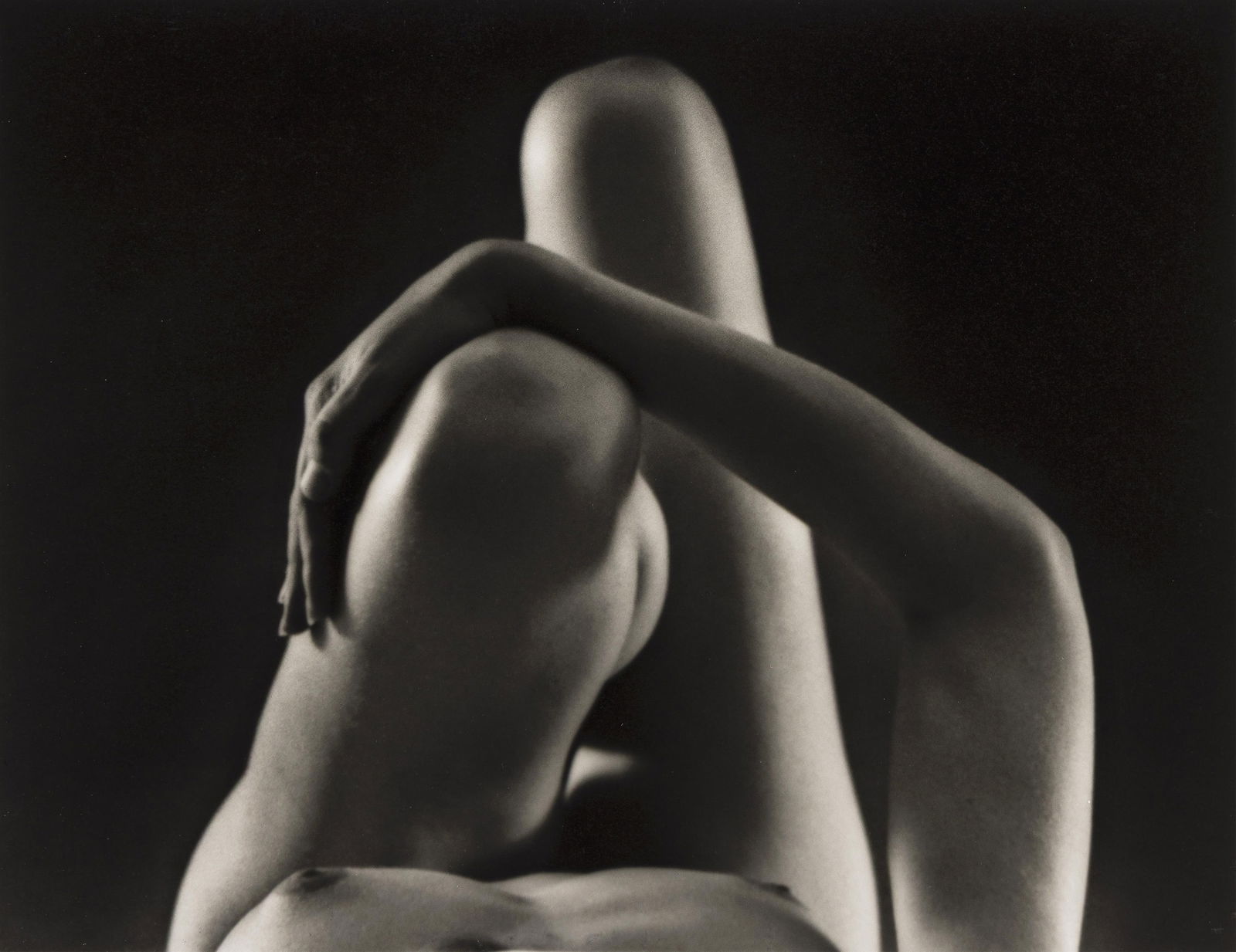 Ruth Bernhard. Knees and Arm. 1976; printed 1988.: Ruth Bernhard1905-2006Knees and Arm. 1976; printed 1988.Silver printWith Bernhard's signature, negative and print dates, and notation "printed for the friends of photography" in ink on verso.The image