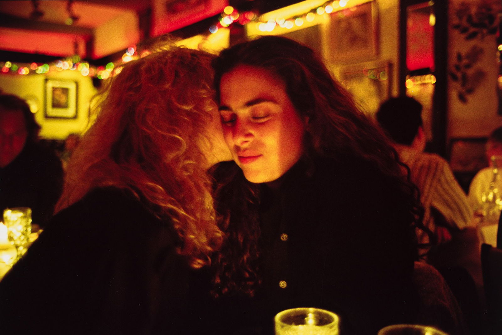 Nan Goldin. Lynette & Donna at Marion's Restaurant, NYC. 1991.: Nan Goldin1953-Lynette & Donna at Marion's Restaurant, NYC. 1991.Cibachrome printWith Goldin's signature, title, and, date in ink, and the Special Edition Printed for Mother Jones stamp with the editi
