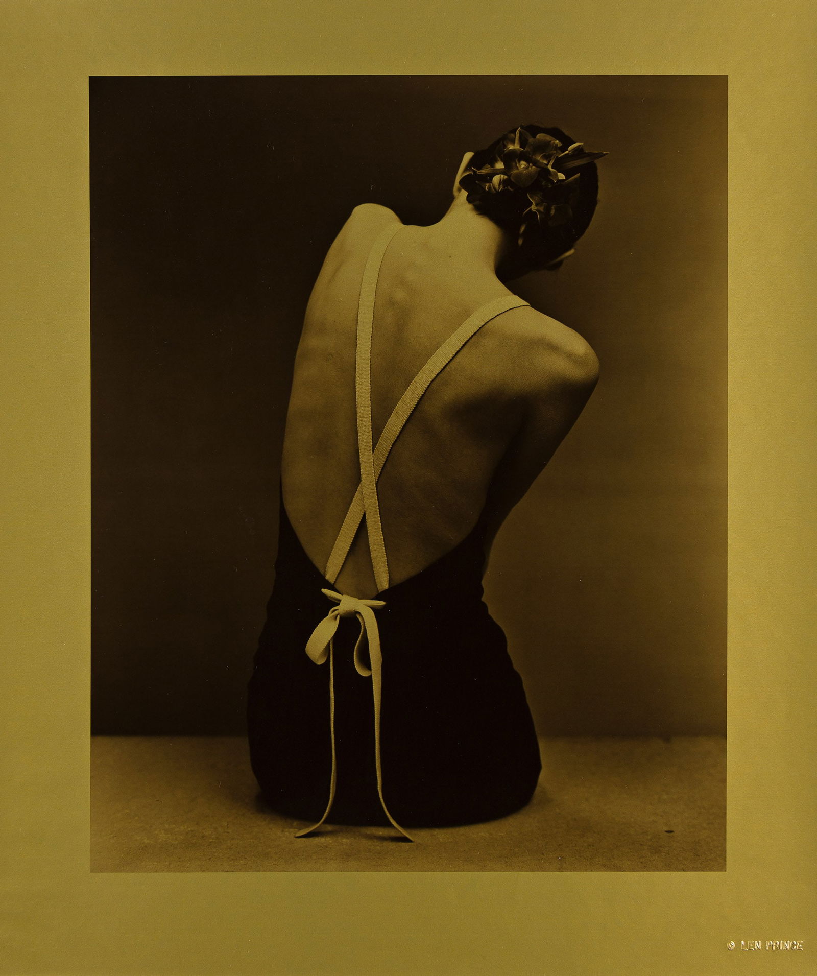 Len Prince. Ford Models Swimsuit Sequence V. 1991.: Len Prince1953-Ford Models Swimsuit Sequence V. 1991.Gold-toned silver printWith Prince's embossed stamp on recto, and his signature, title, date, and edition notation 1/10 in ink on verso.The i