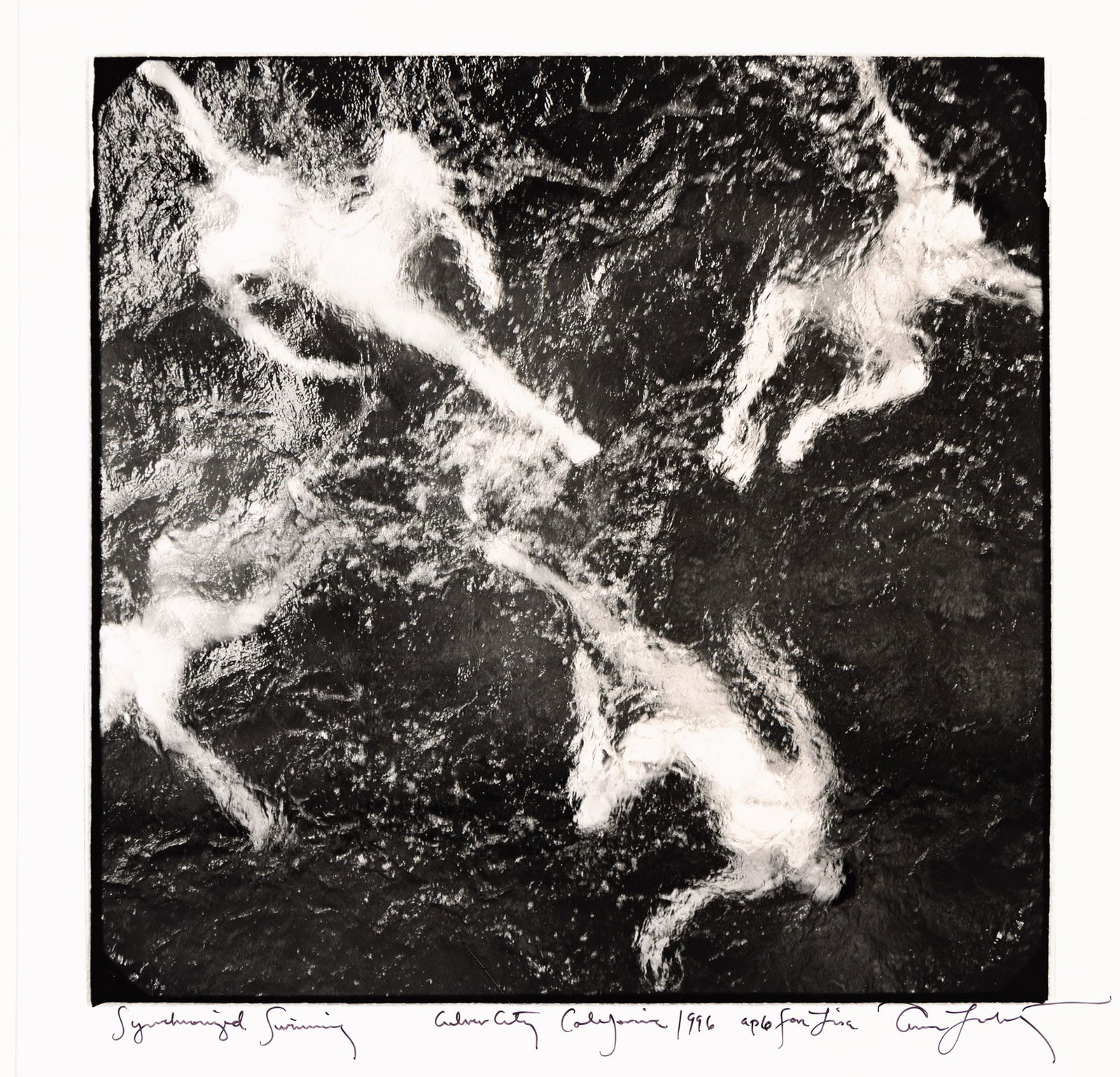 Annie Leibovitz. Synchronized Swimmers, Culver City, California. 1996.: Annie Leibovitz1949-Synchronized Swimmers, Culver City, California. 1996.Silver printWith Leibovitz's signature, title, date, edition notation AP 6, and dedication in ink on recto.The image 13 1/2 x 1