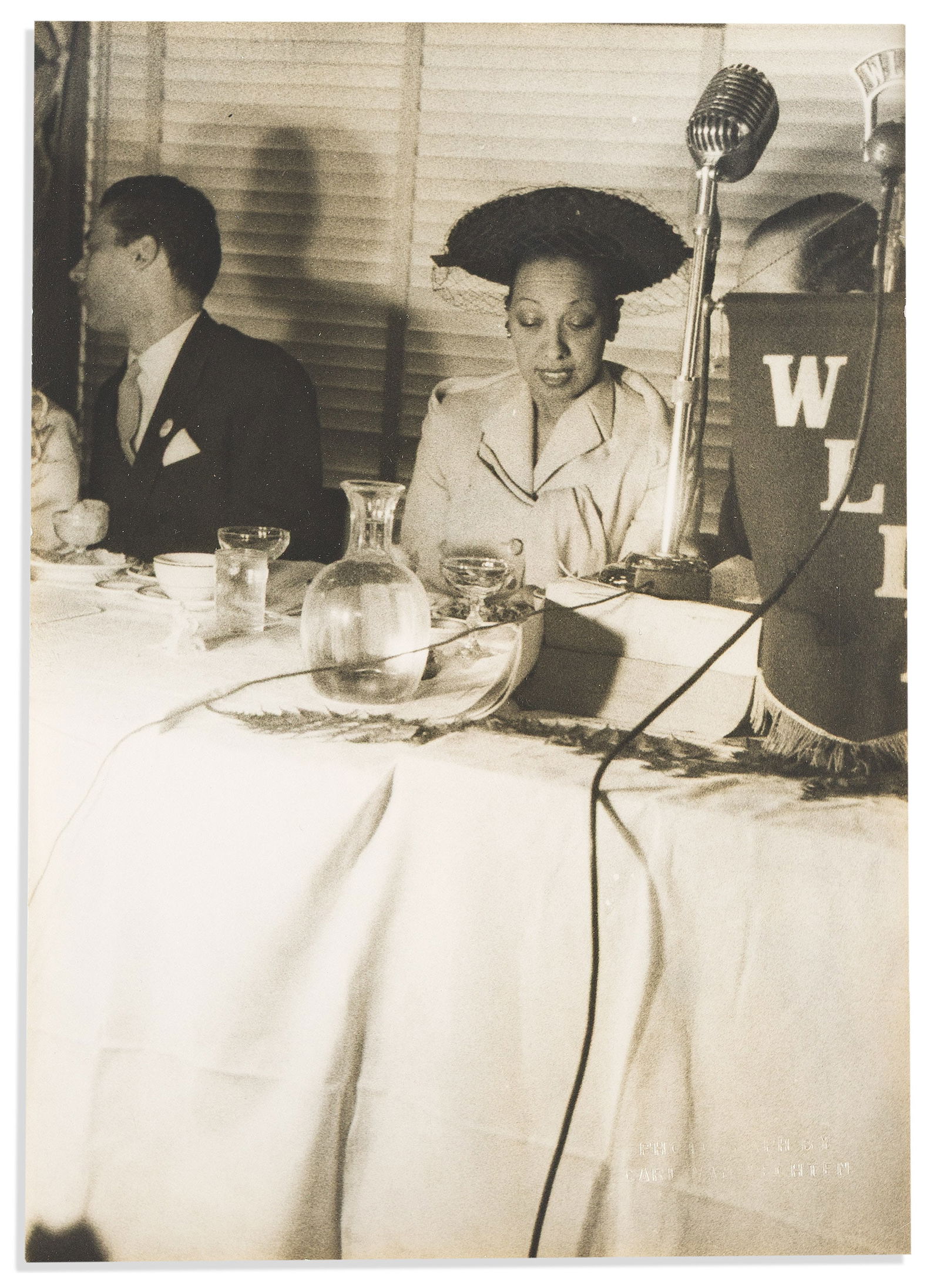 (ENTERTAINMENT.) Carl Van Vechten, photographer. Josephine Baker attending luncheon in her honor.: (ENTERTAINMENT.)Carl Van Vechten, photographer. Josephine Baker attending the "Josephine Baker Day" NAACP luncheon in her honor.New York, 20 May 1951Silver print photograph, 9½ x 